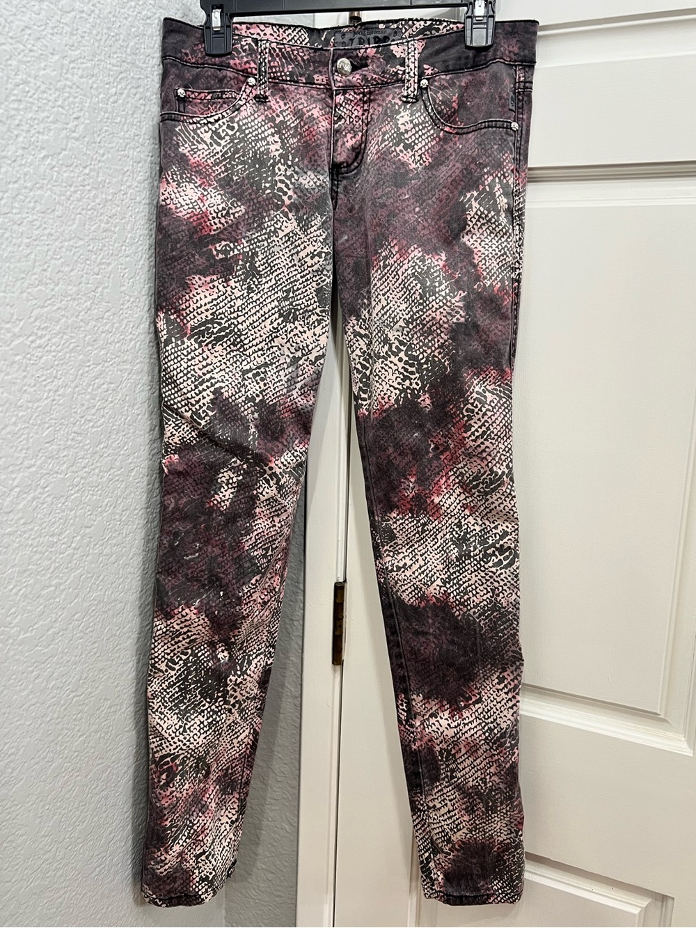 TRIPP skinny jeans with skull accent hardware